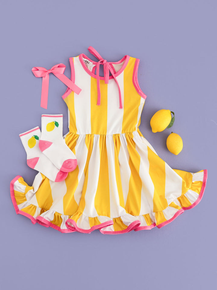 girls yellow and white sleeveless striped twirl dress with pink binding paired with lemon socks and matching pink satin hair bow