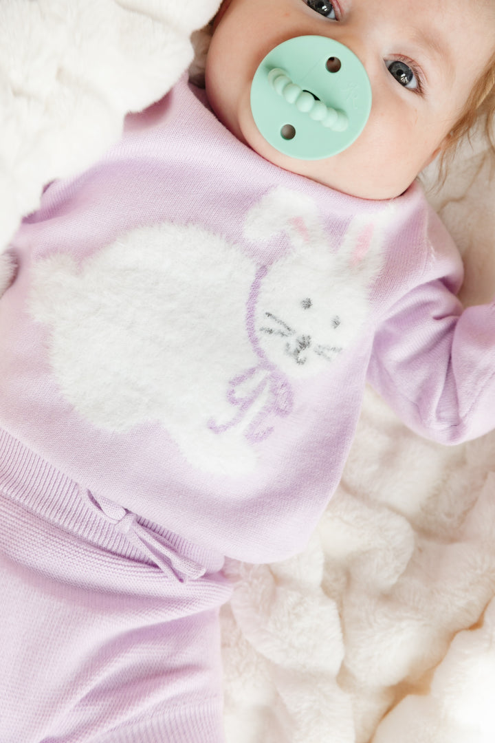 baby girl in lilac knit sweater with fuzzy bunny on it and matching bloomers