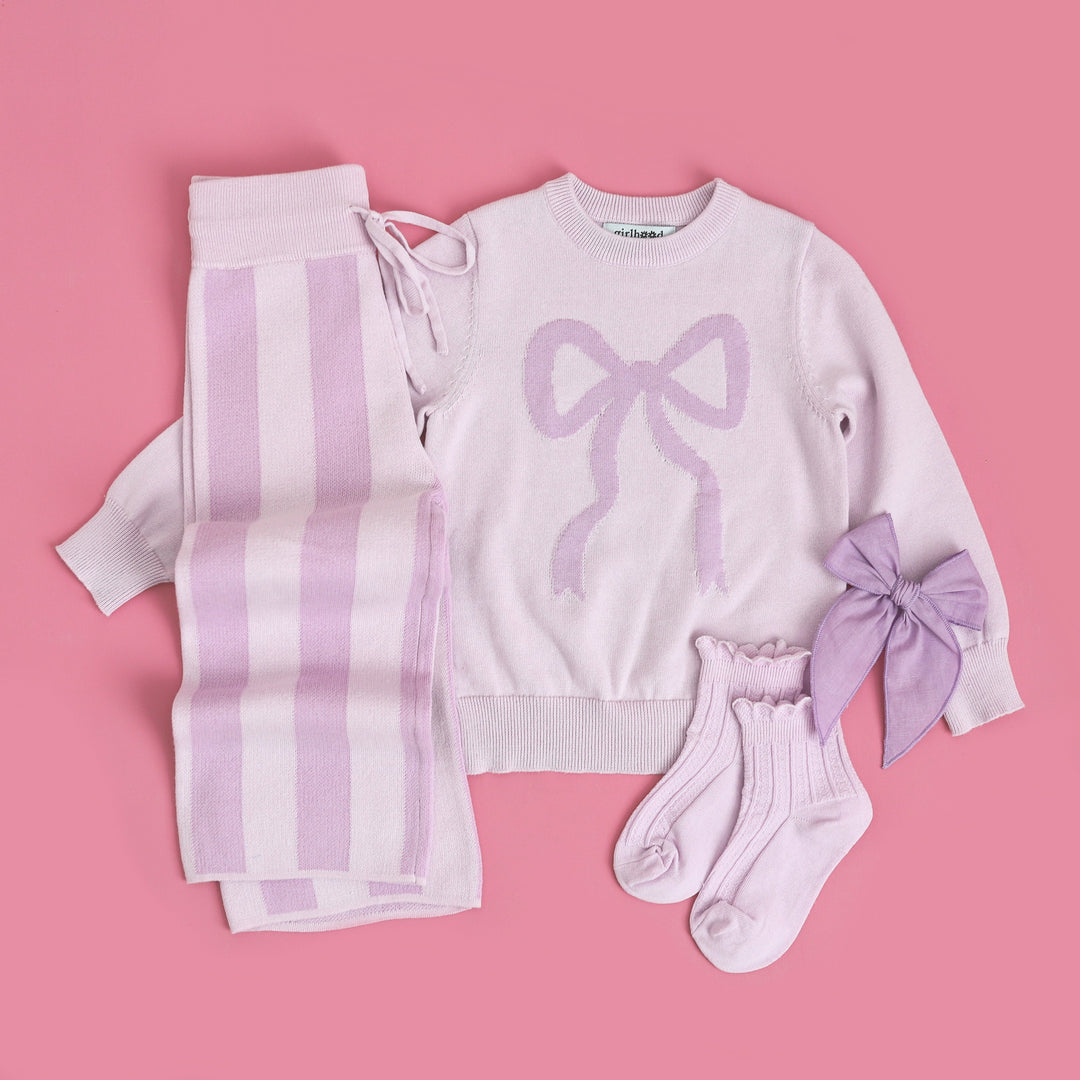 girl's pastel purple pullover bow sweater with matching two tone purple sweater pants, socks and hair bow