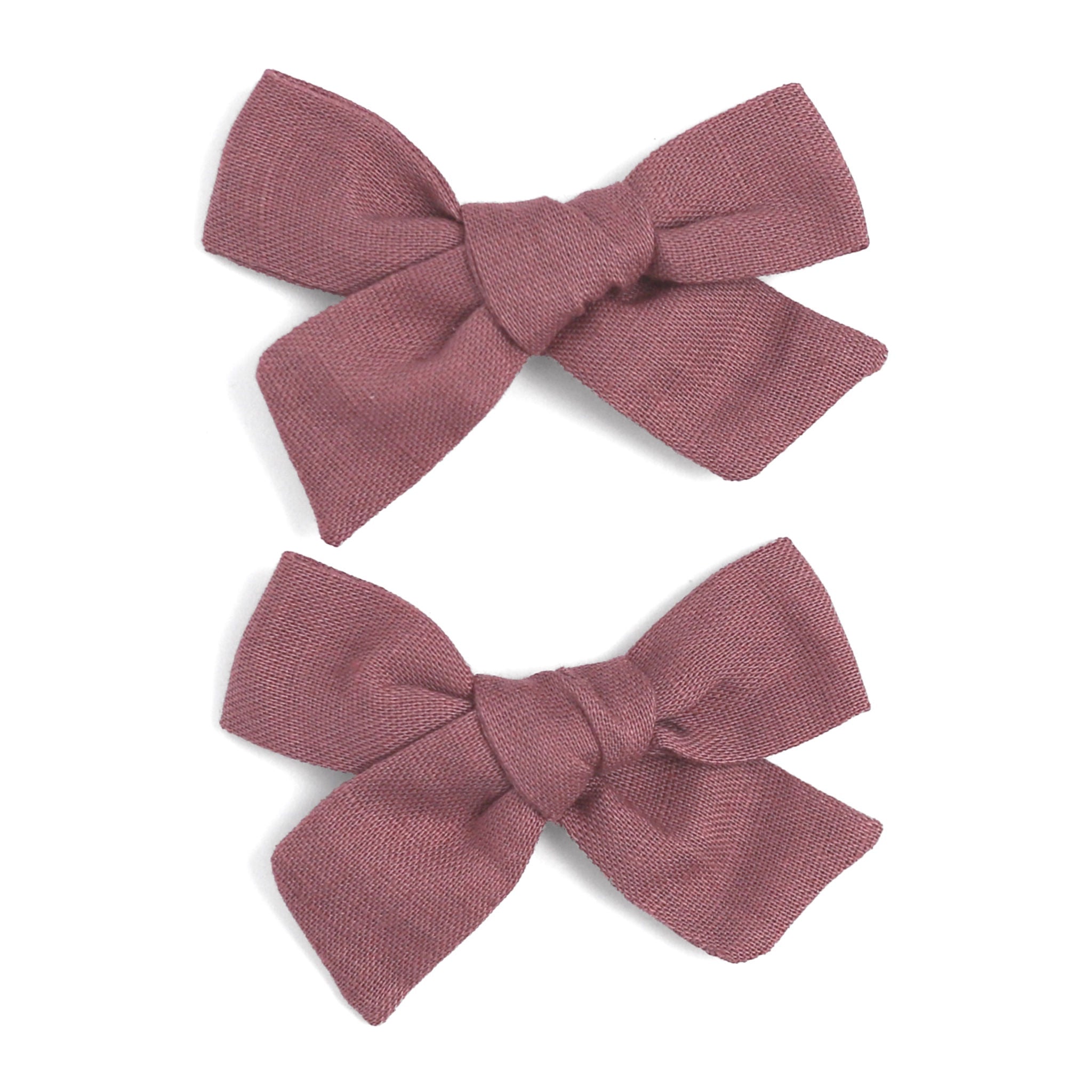 mauve linen pigtail bows