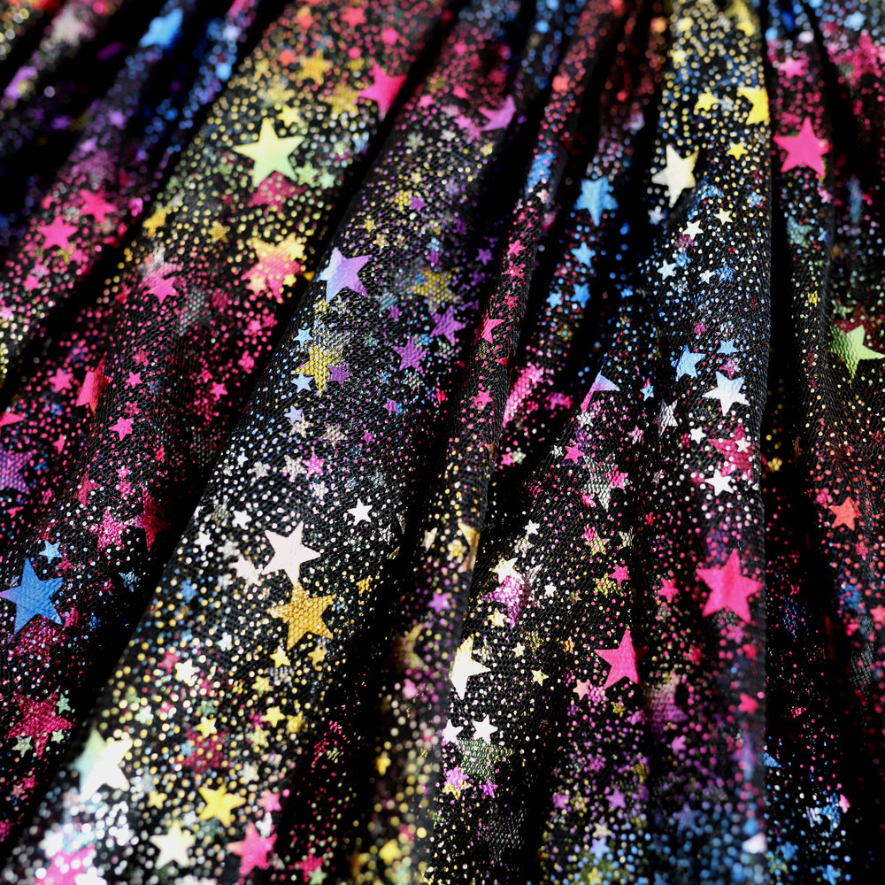 detail photo of black tulle and rainbow metallic stars fabric of girls tutu skort