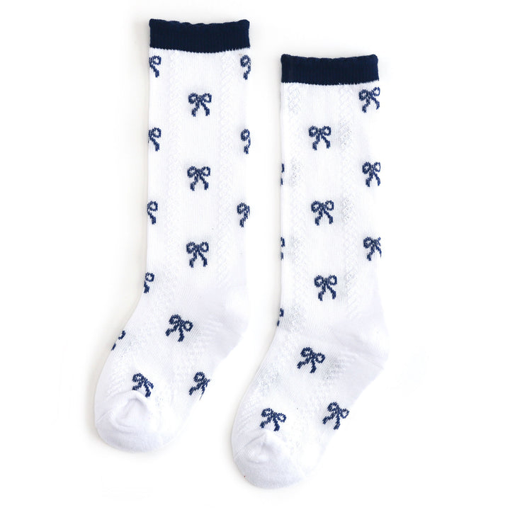 girls white knee high socks with navy bows and navy scalloped trim