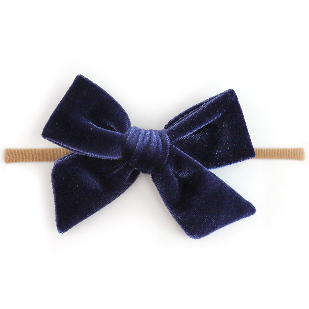 baby girl navyvelvet hair bow on soft, stretchy nude elastic headband