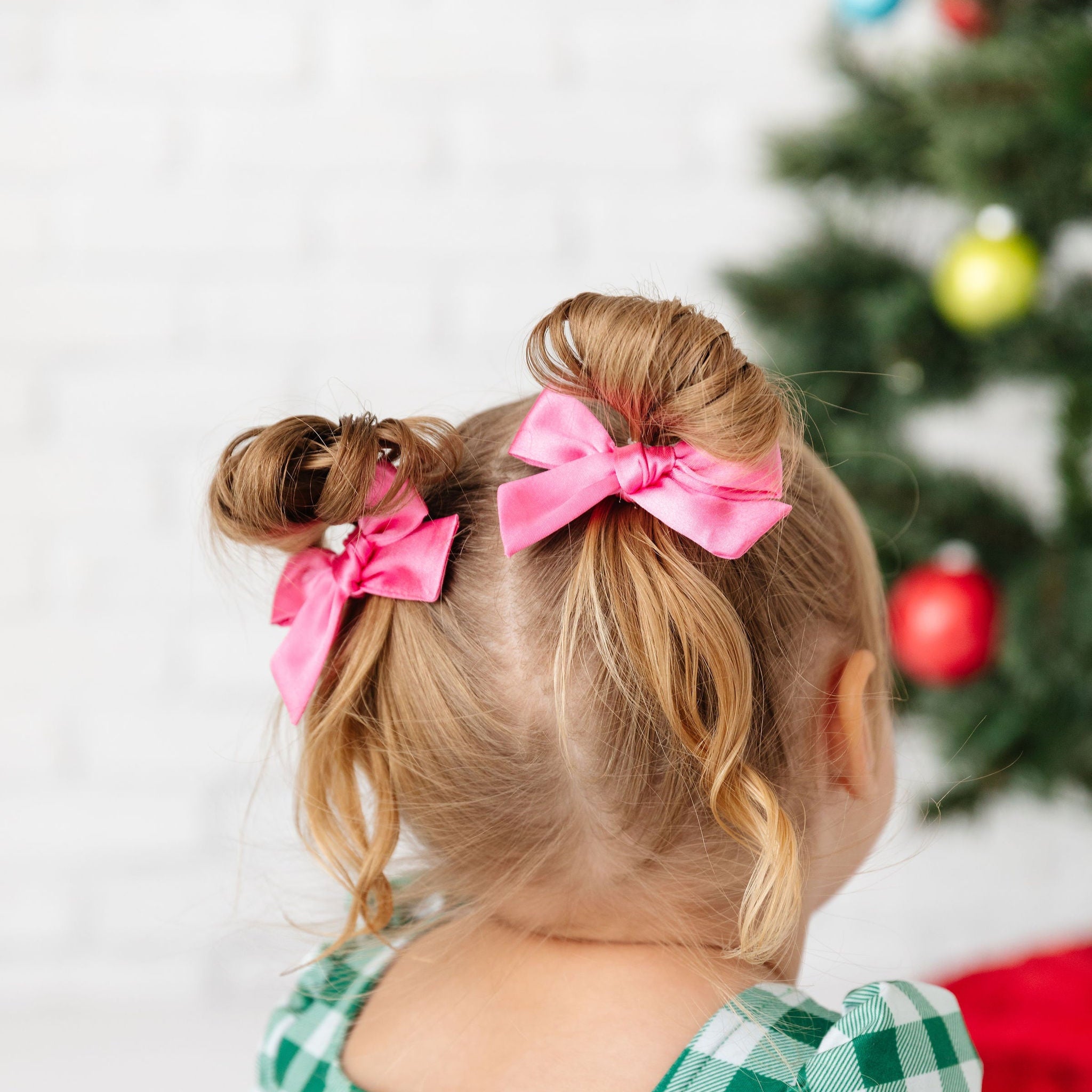 taffy pink satin pigtail bows with green gingham dress on little girl