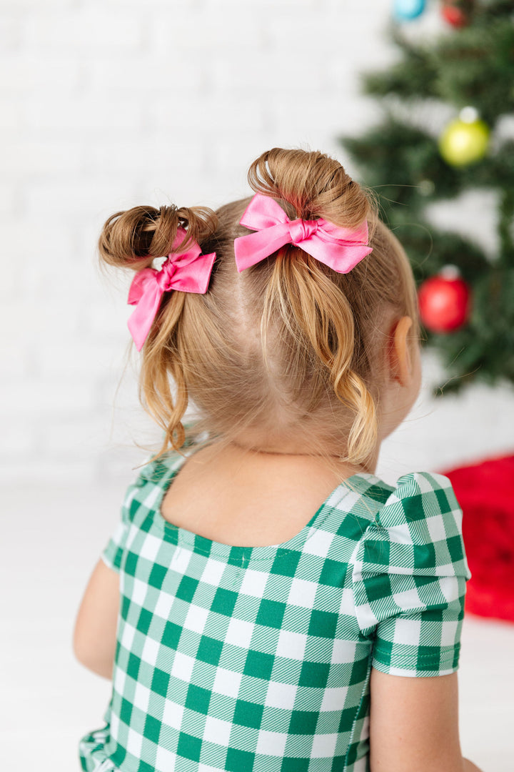 taffy pink satin pigtail bows with green gingham dress on little girl