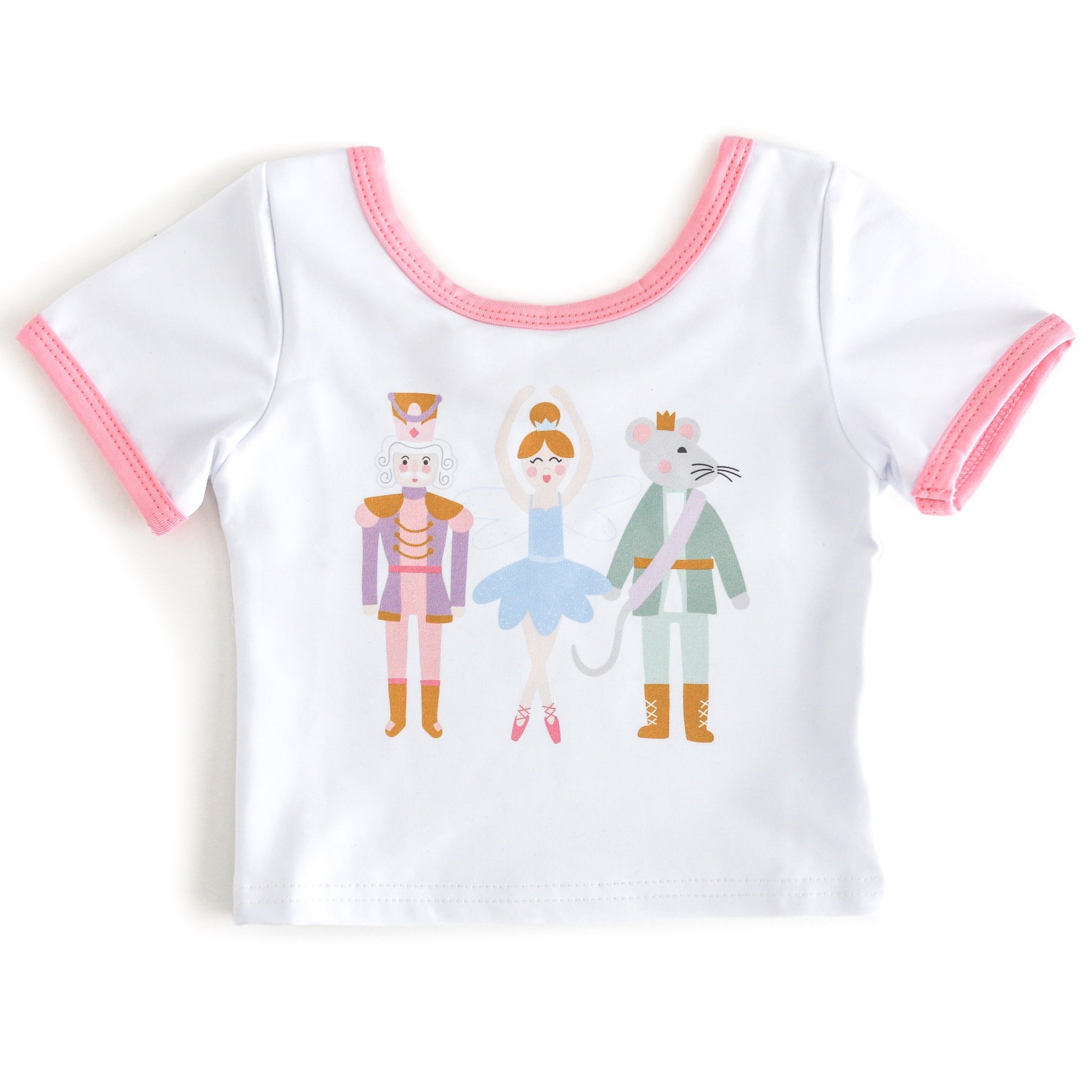 girls' white cotton blend top with pink binding and nutcracker print featuring three characters