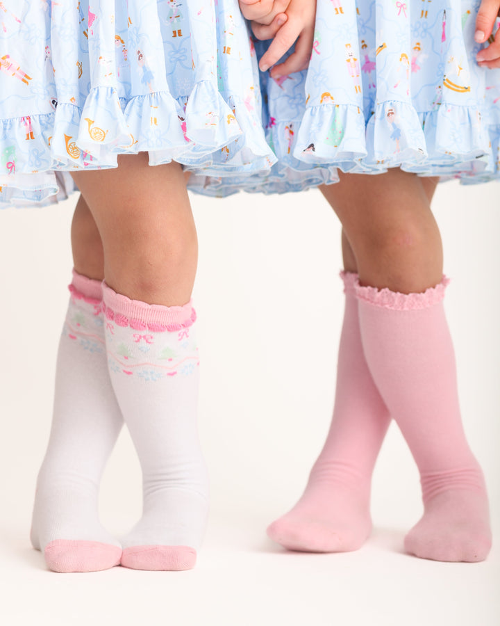 little girl sin blue nutcracker twirl dresses and coordinating white faire isle and blossom pink knee high socks