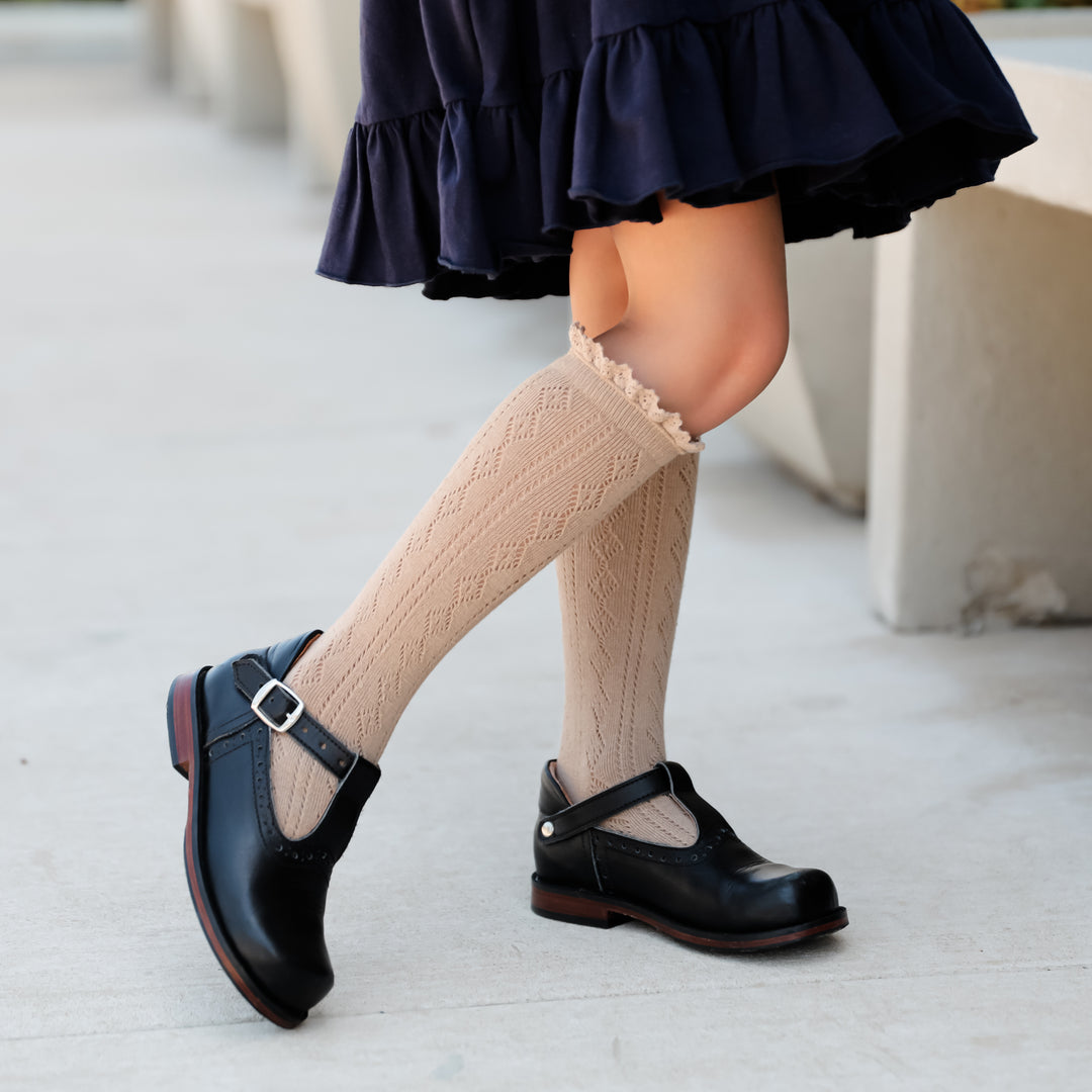 beige crochet knit lace knee high socks with girls navy school uniform dress