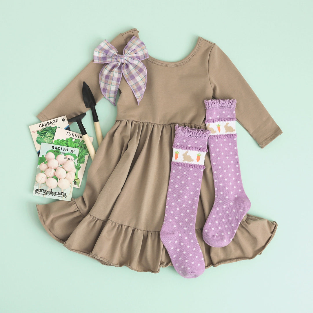 neutral oat/tan dress with purple easter outfit accessories for little girls' easter outfit