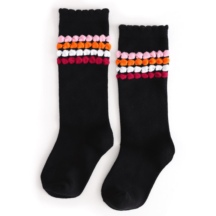 girls' black scallop trimmed knee high socks with raised bubble stripes in pink, orange, white and raspberry to match Halloween outfits