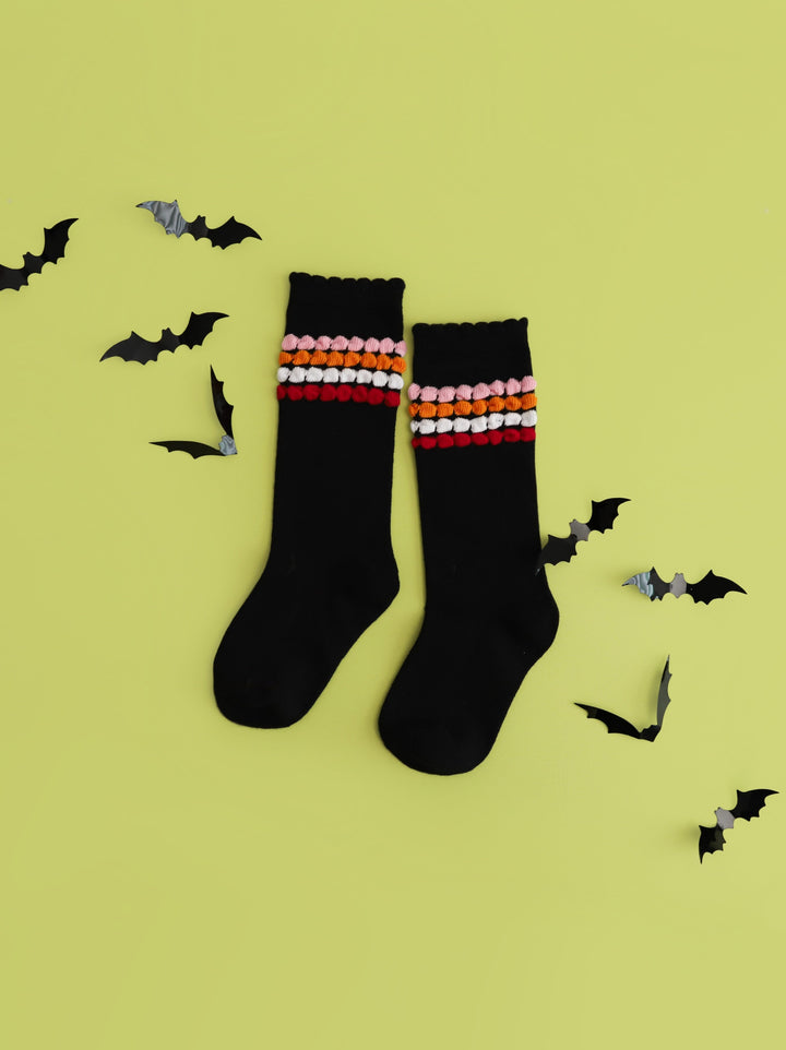 girls' black knee high socks with bubble stripes to match Halloween outfits