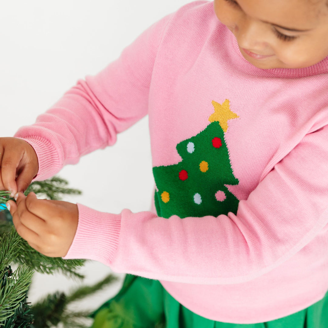 girls pink knit sweater with green christmas tree 