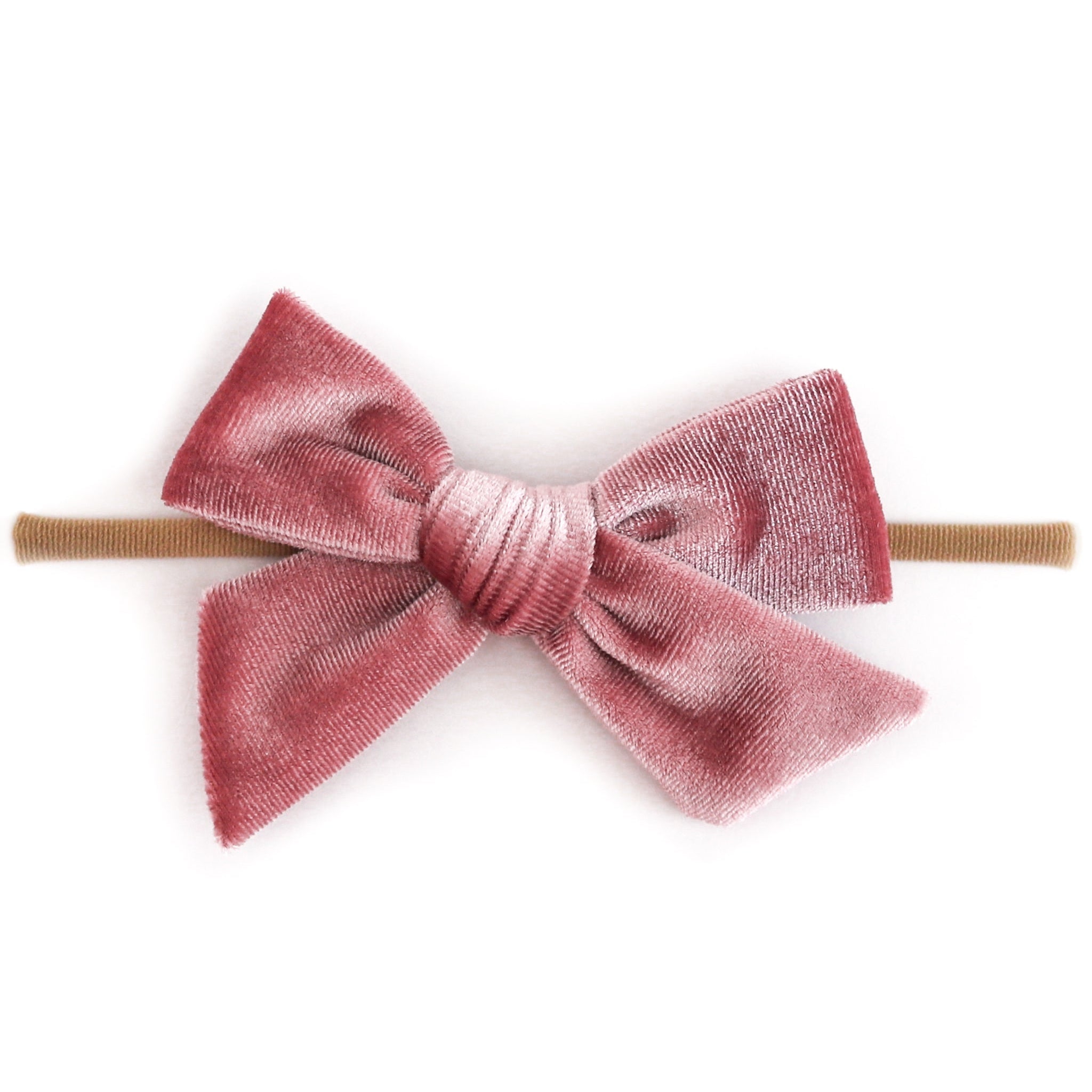 baby girl dusty pink velvet hair bow on soft, stretchy nude elastic headband