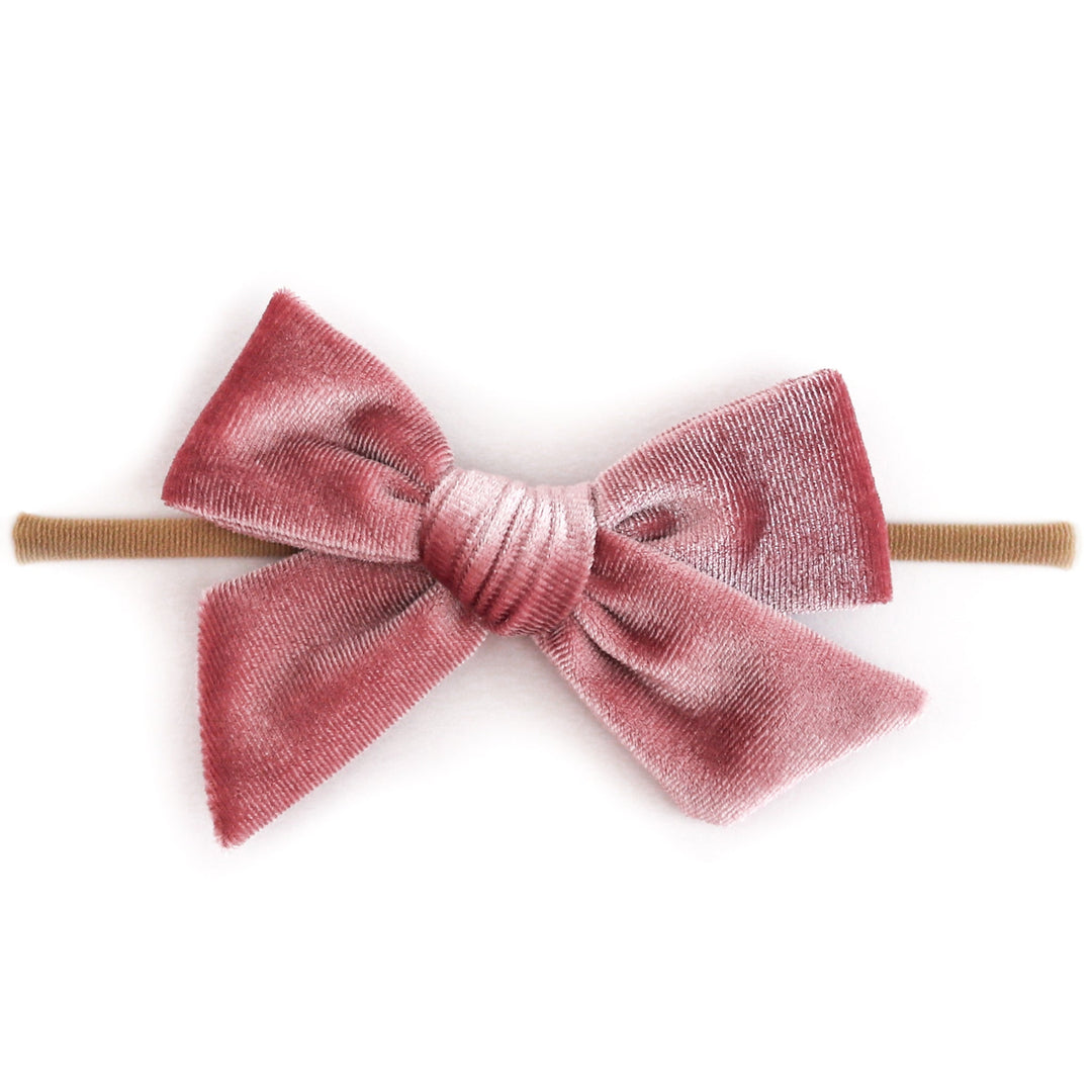 baby girl dusty pink velvet hair bow on soft, stretchy nude elastic headband