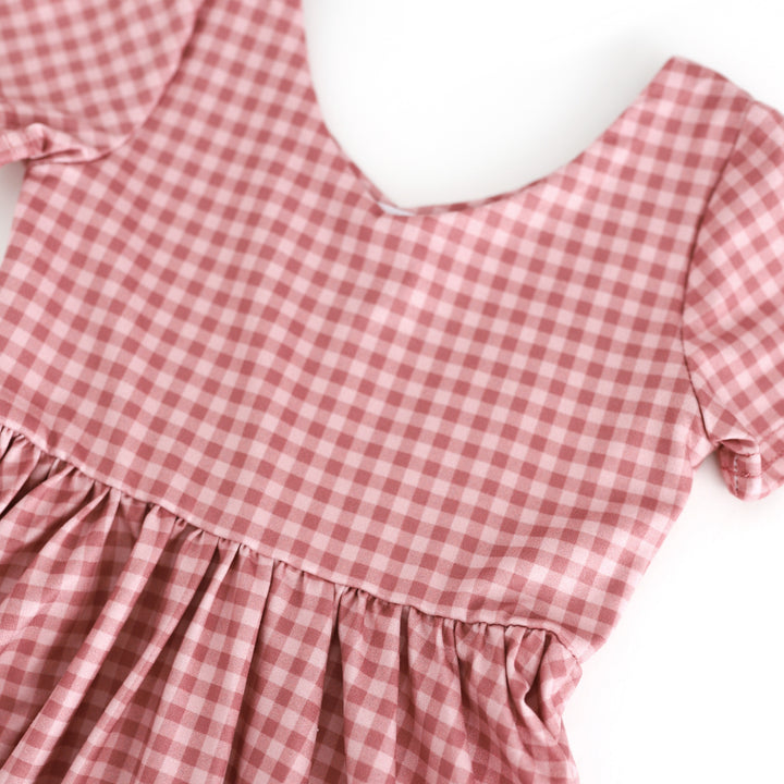 detail photo of pink gingham v-neck twirl dress bodice 