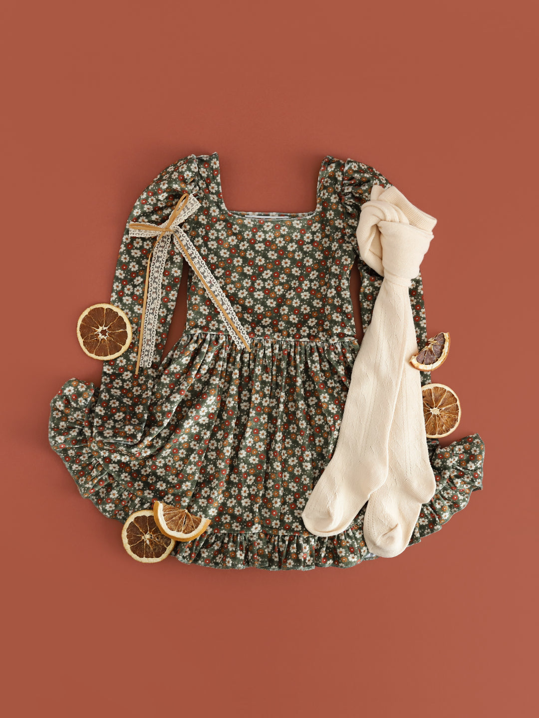 girls' olive green long sleeve velvet twirl dress with petite floral pattern and matching cream tights and bow