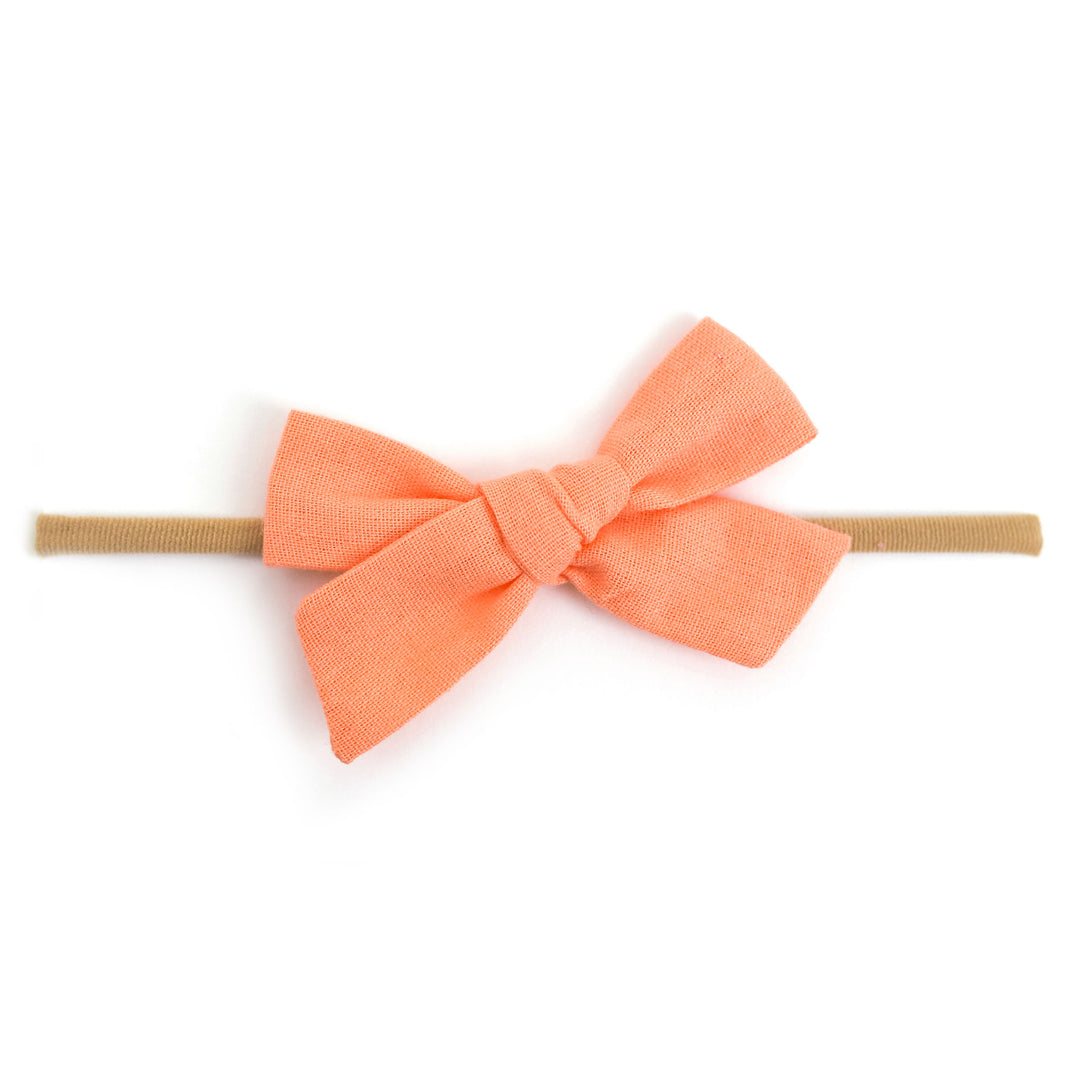 tangerine orange linen baby bow on nylon headband