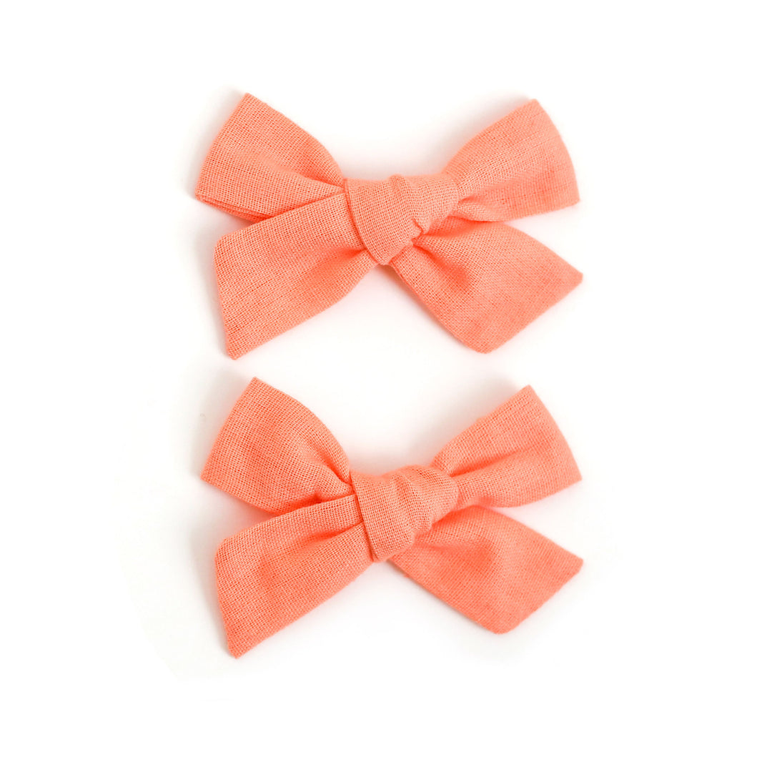 light pastel orange linen pigtail bows on clips