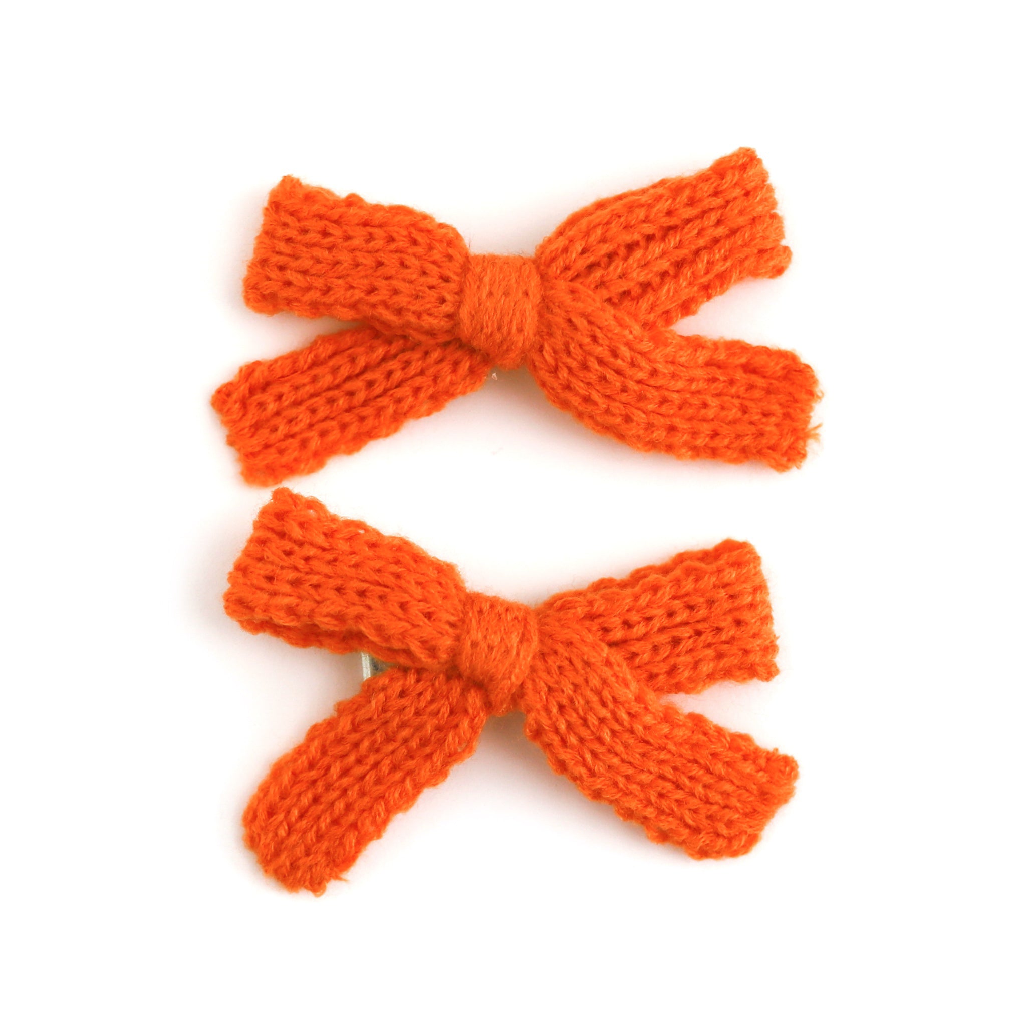 girls' knit pigtail bows on clips in orange to match Halloween outfits