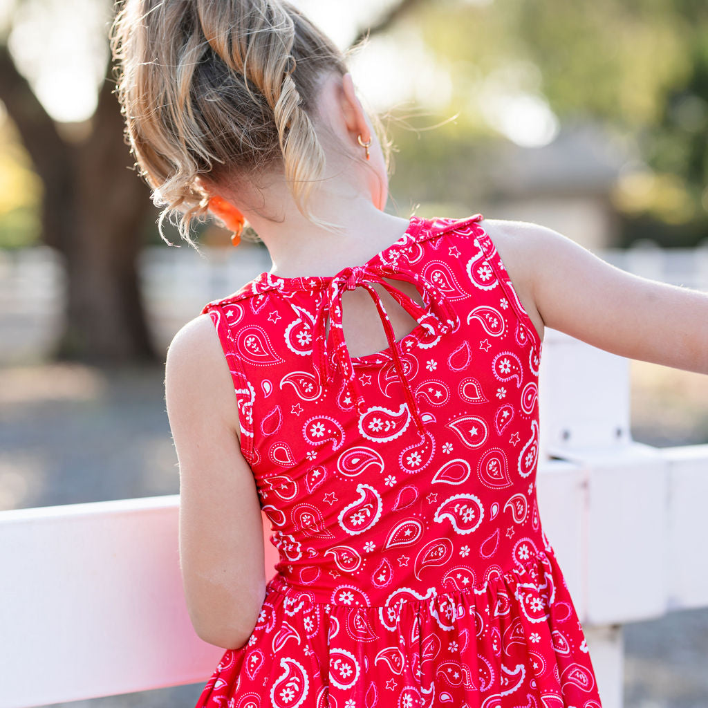back detail of red paisley print twirl dress