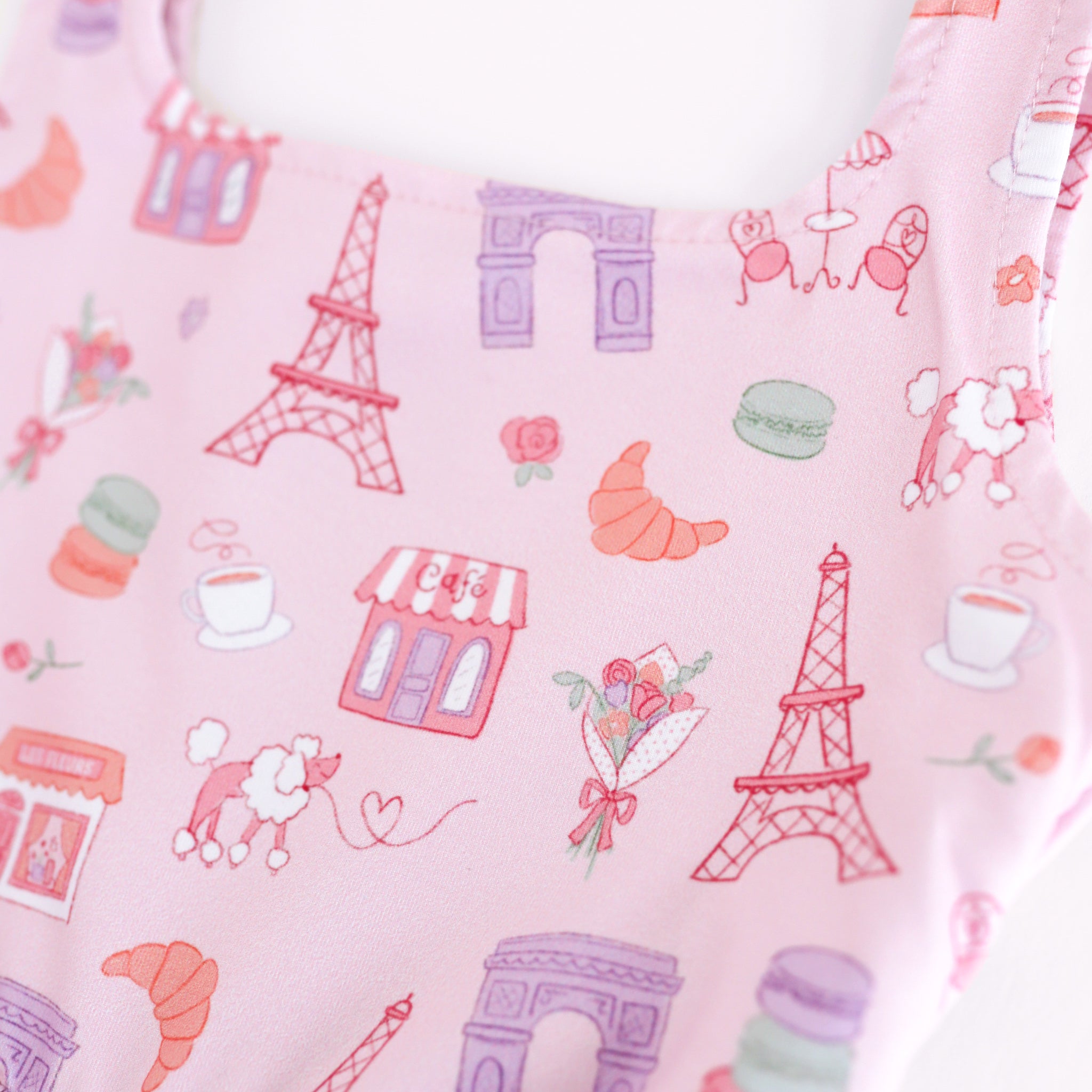 girls twirl dress with Paris print detail featuring French pastries, poodles and Eiffel tower