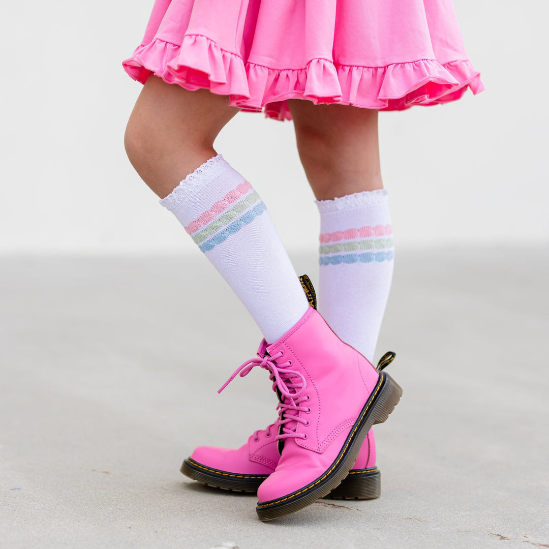 girls knee high socks with raised pastel stripes and matching pink dress for pastel Christmas 