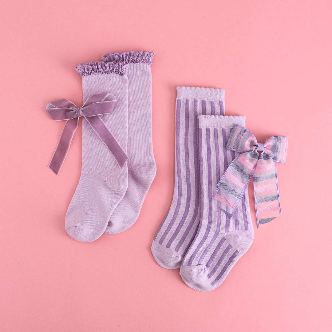 two sets of light purple hair bows and knee socks for birthday girl outfits