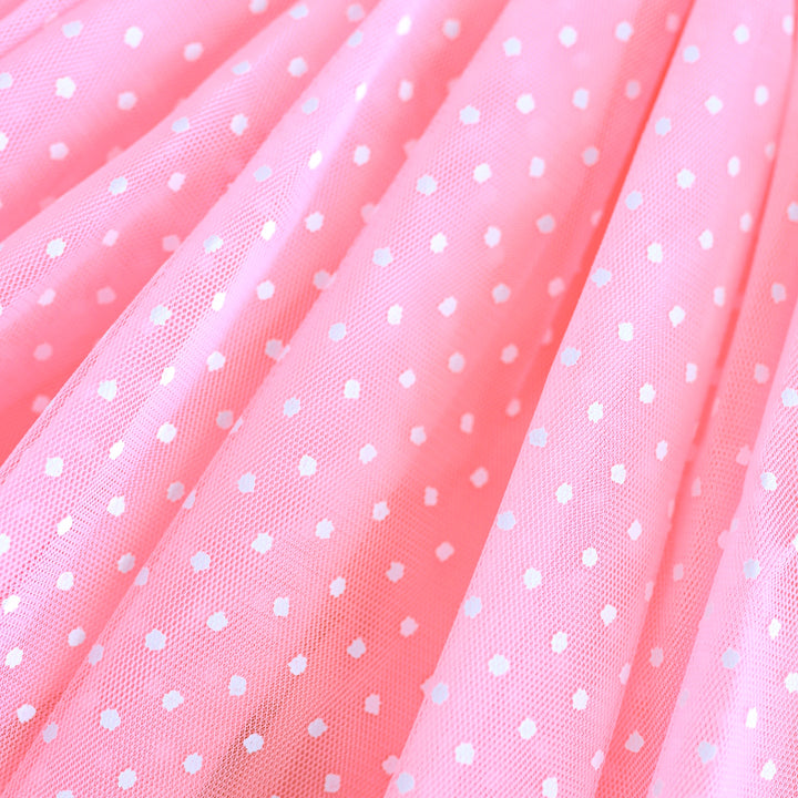 Pink tulle fabric with white polka dots