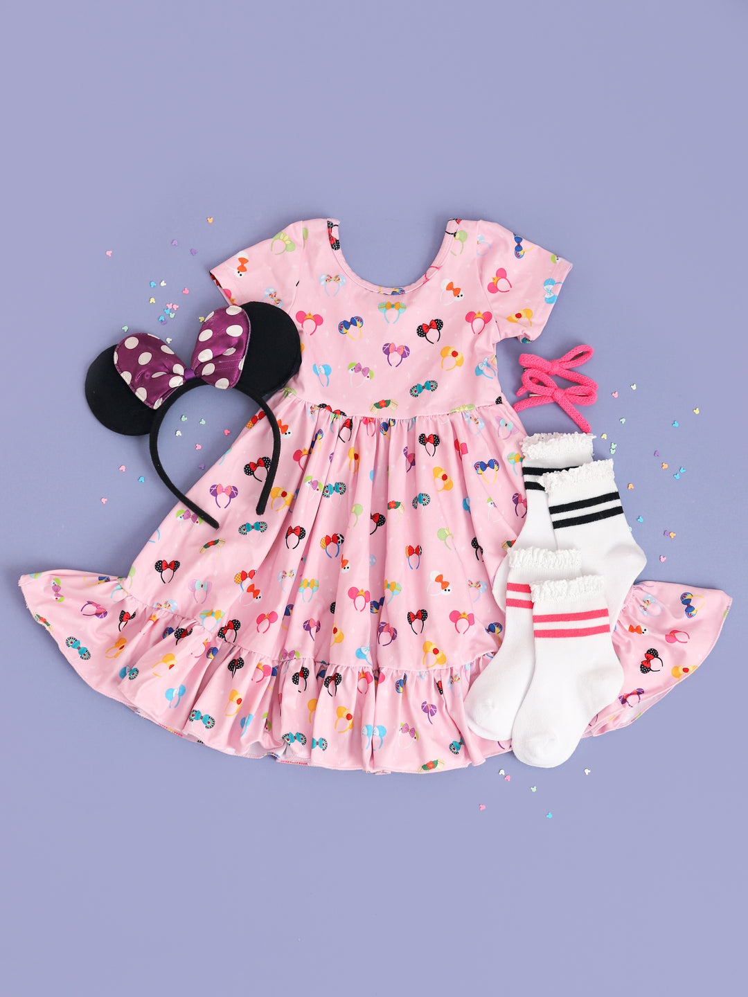 pink magical ears dress with purple minnie mouse ears and pink and black striped midi socks