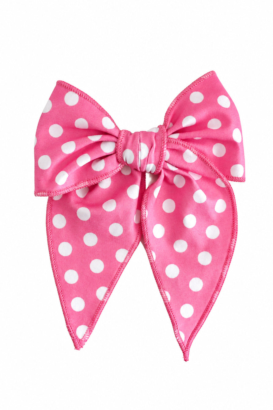 girls' pink fabric hair bow on clip with white polka dots for pink Minnie vibes