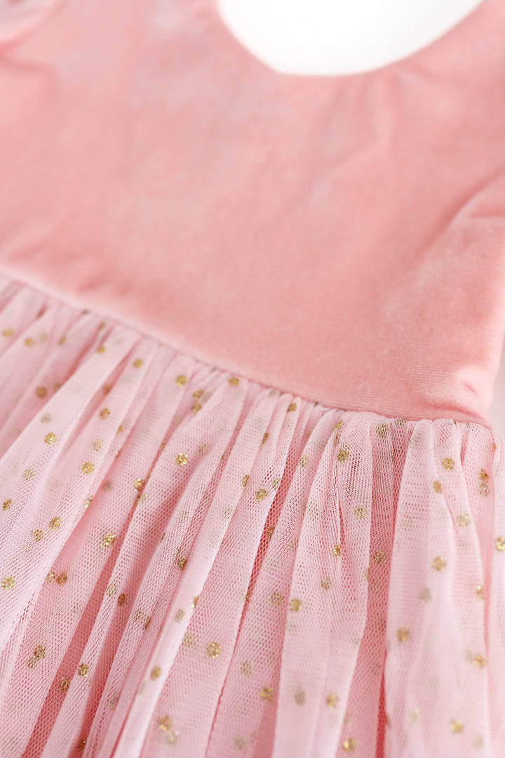 girls pink velvet tutu dress detail image with large sparkly gold dots