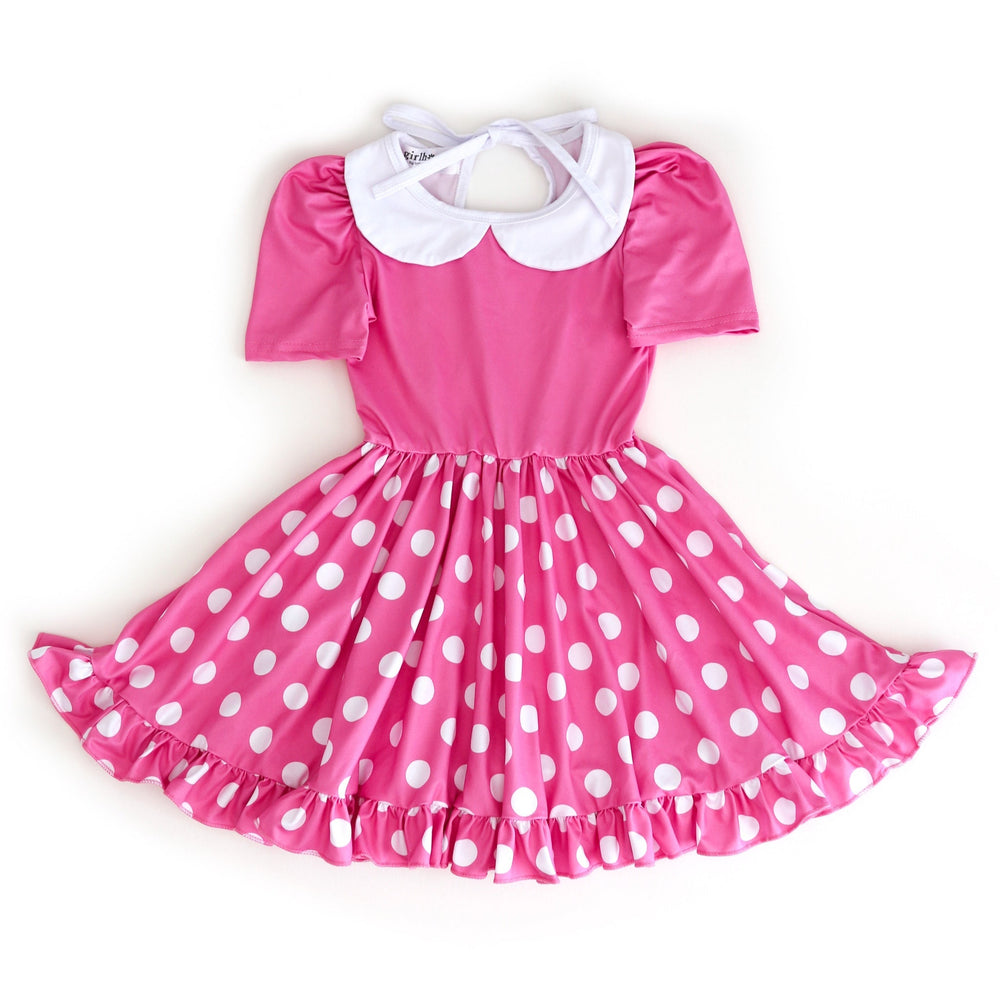 girls' short sleeve pink Minnie inspired twirl dress with pink bodice, pink skirt with white polka dots, and white peter pan collar