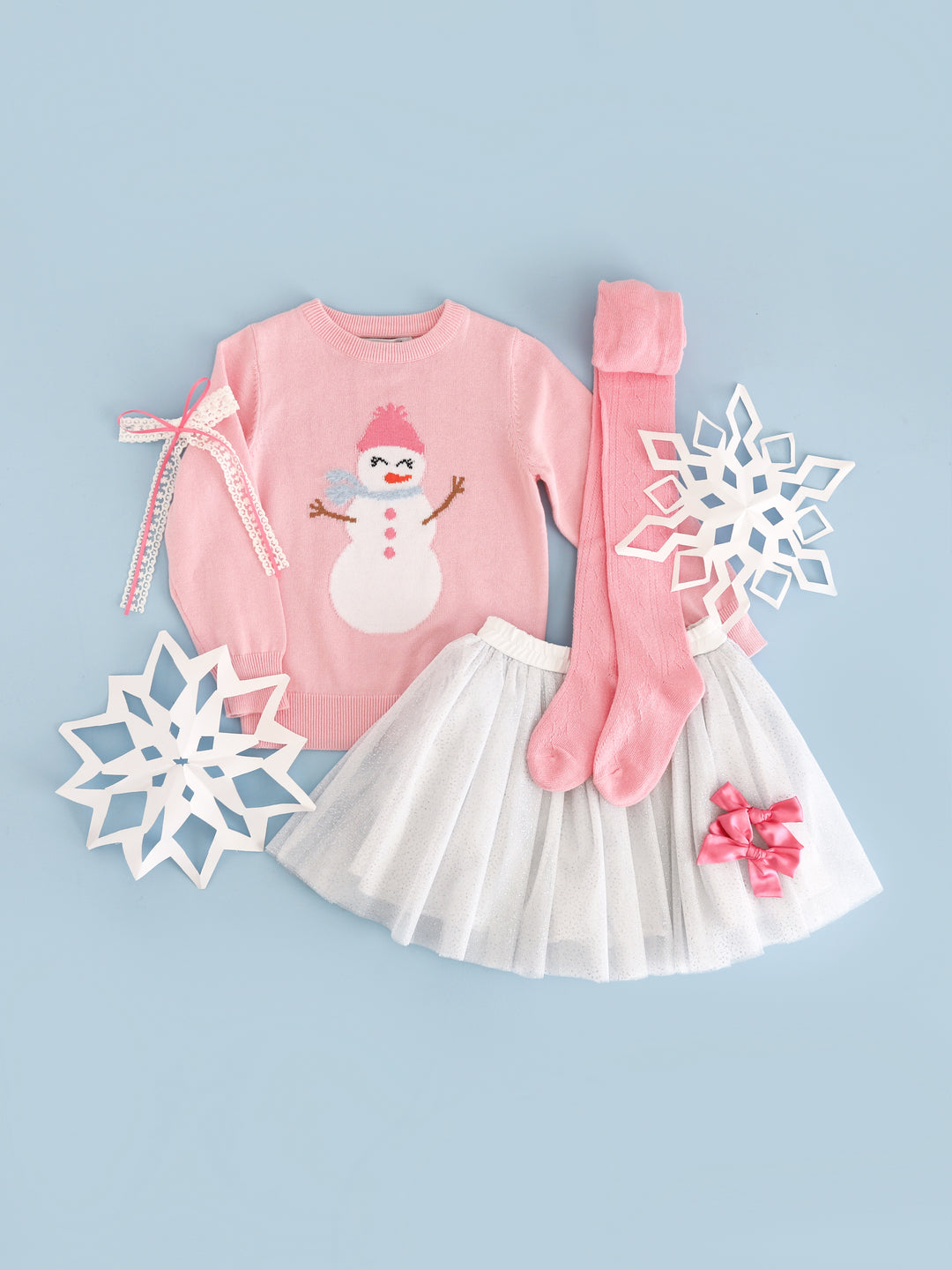 little girls' winter wonderland themed Christmas outfit with pink cotton knit sweater with snowgirl design, white sparkly tulle tutu skirt, pink open knit tights and matching hair bows