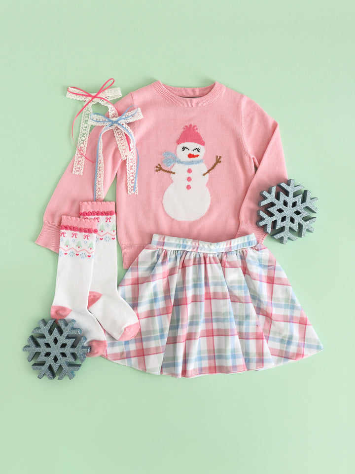 girls' pink pullover knit sweater with snowgirl design paired with pastel velvet plaid skirt, matching fair isle knee highs and hair bows for winter wonderland vibes