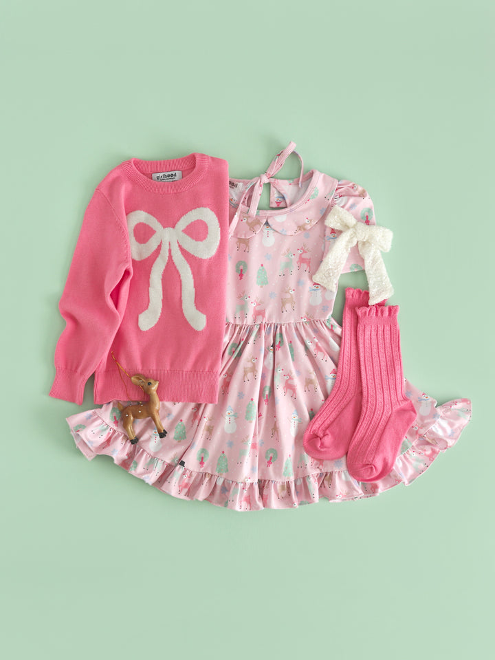 girls' light pink collared twirl dress with pastel winter wonderland print, taffy sweater with white sparkle bow design and matching knee socks and bow