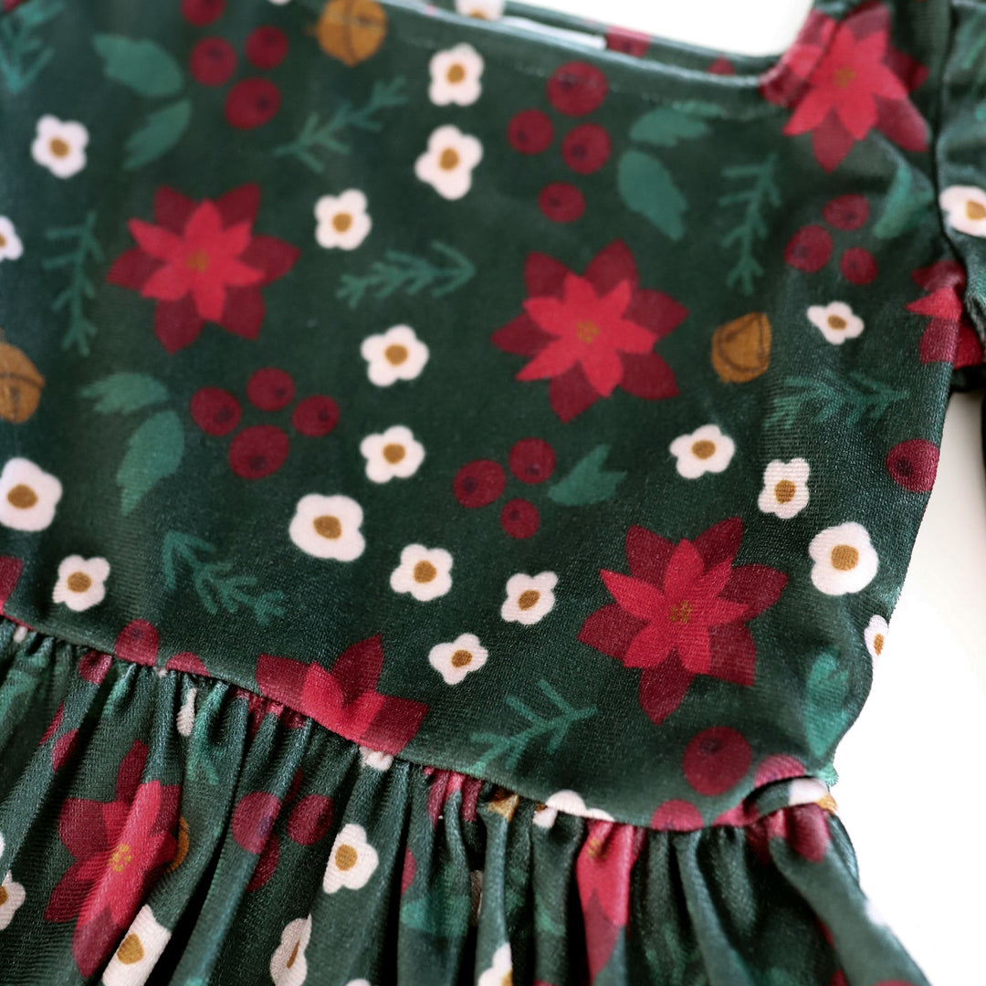 details of poinsettia print christmas dress for girls