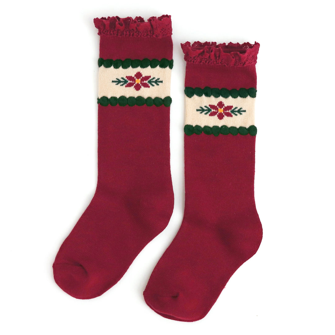 little girls red knit knee high socks for Christmas with poinsettia design