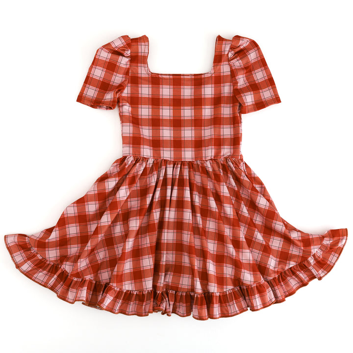 girls short sleeve, square neck twirl dress with puffed sleeve and ruffled hem in pumpkin spice plaid print