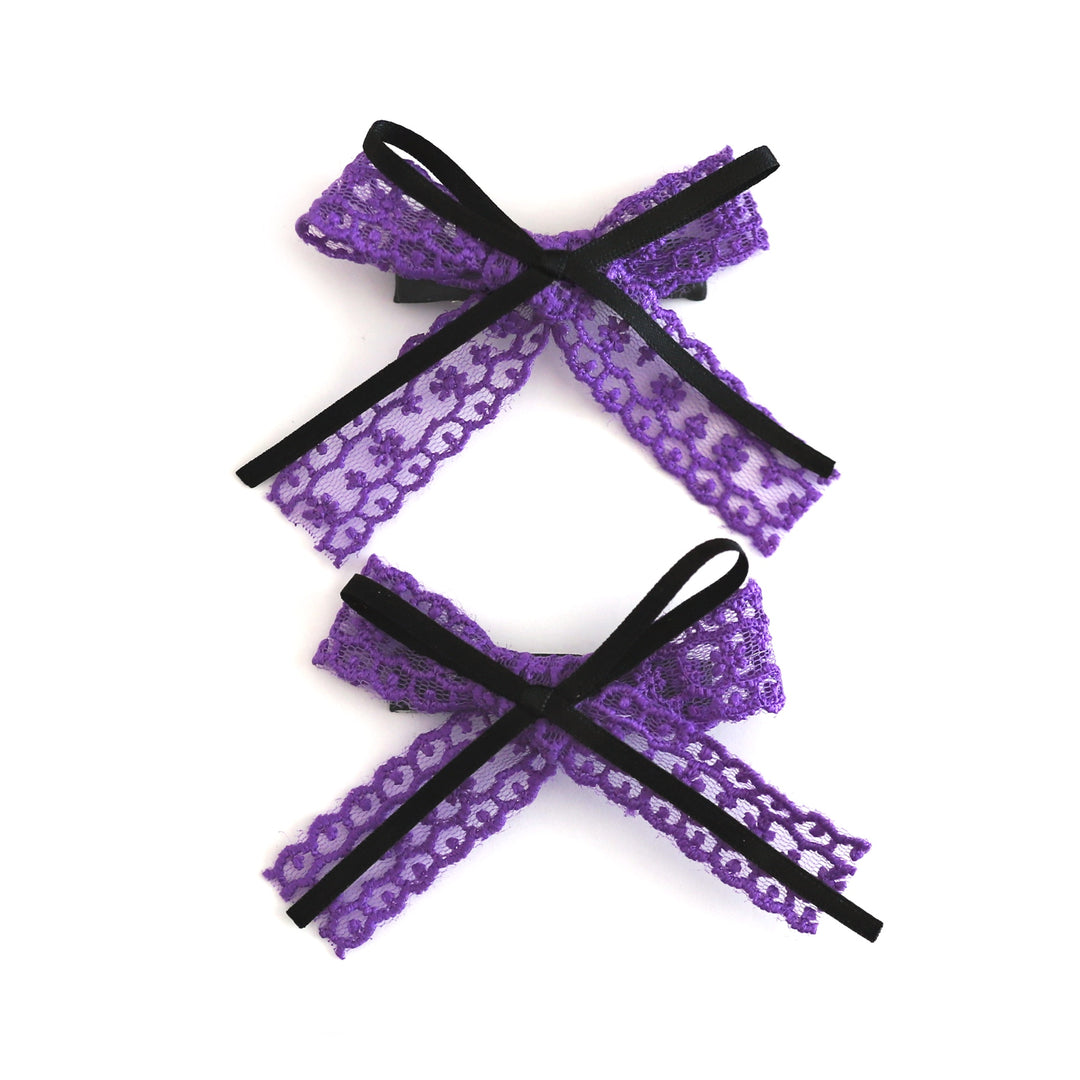 girls double pigtail bows on clips in purple lace with black ribbon made to match witchy Halloween outfits