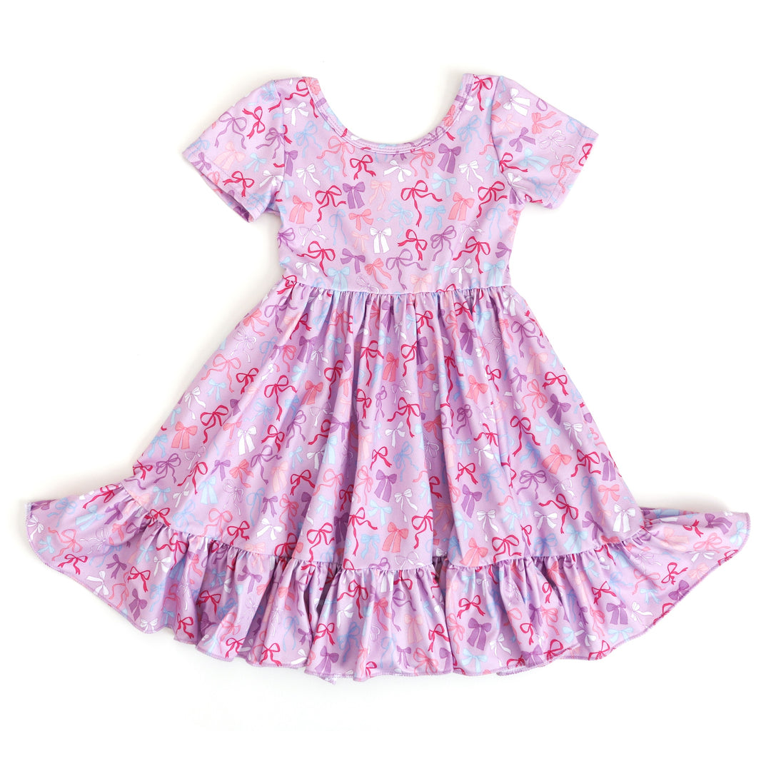 girl's short sleeve lavender twirl dress with pastel bow print