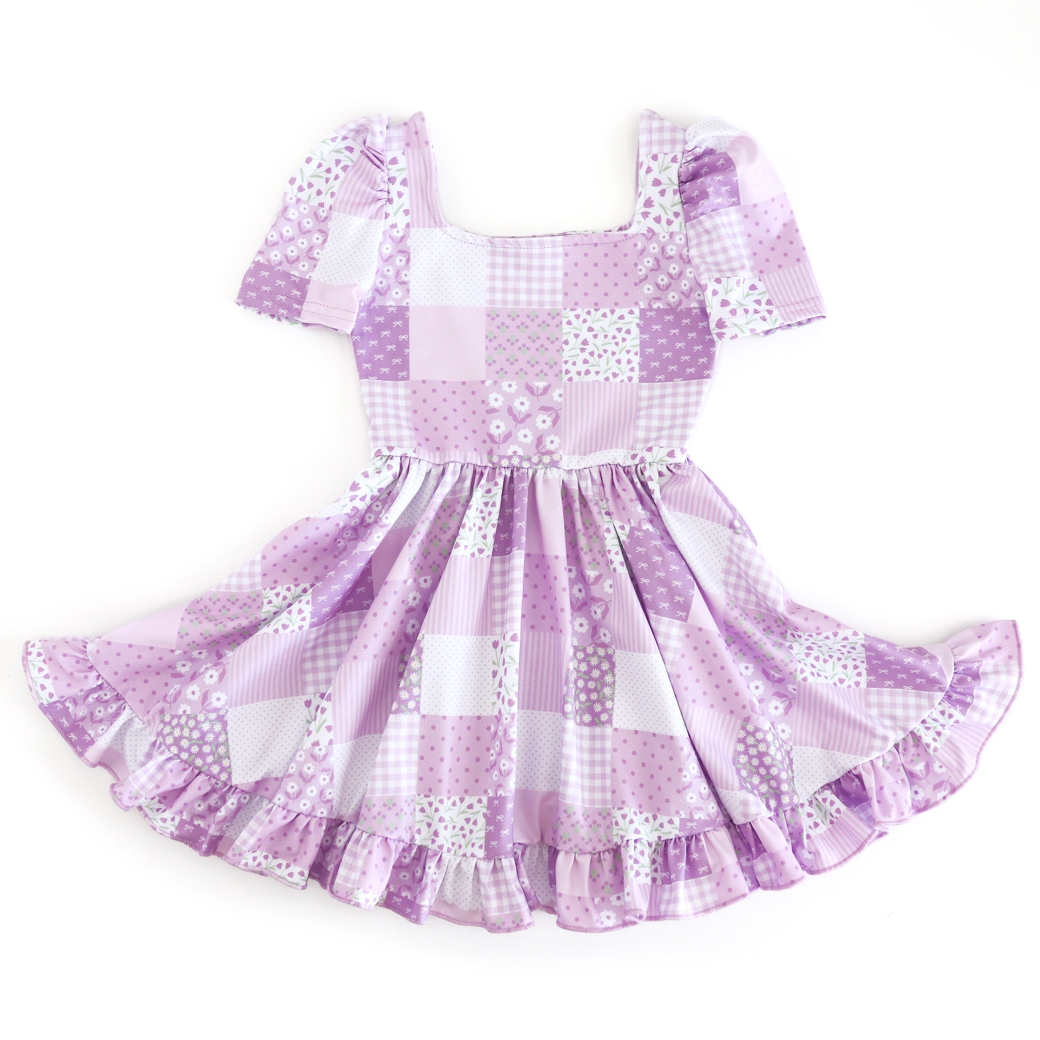 girls square neck short sleeve twirl dress with a floral patchwork print in shades of lavender for spring