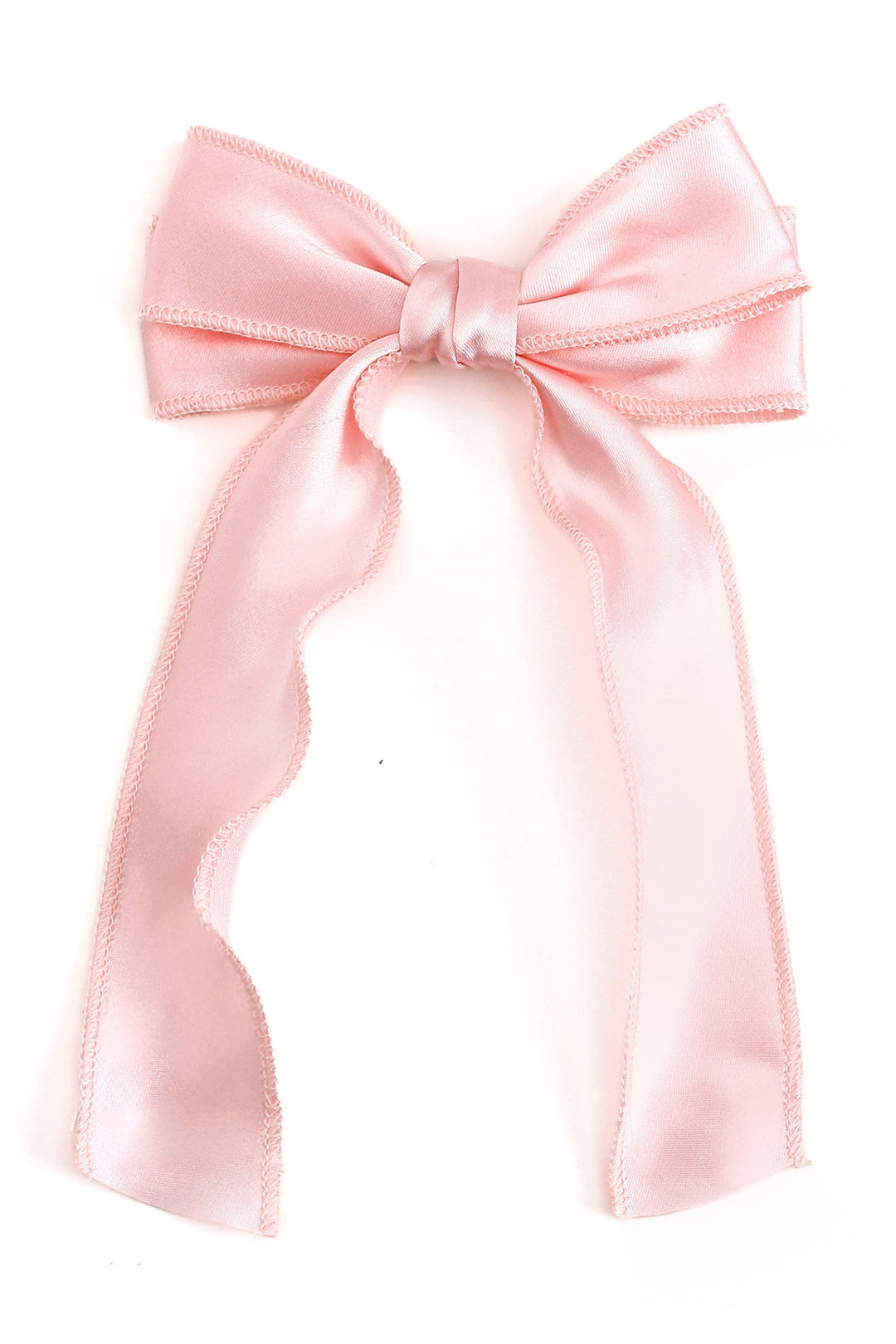 light pink satin double hair bow shown on a solid white background
