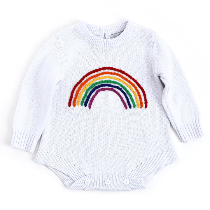 baby and toddler sweater romper in white with hand embroidered rainbow design on front