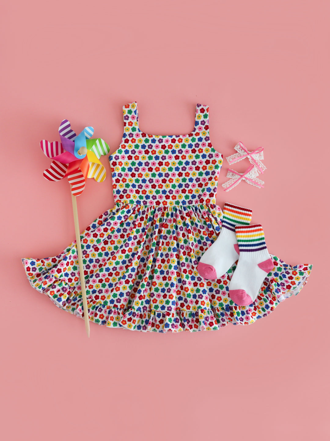 girls' square neck rainbow floral twirl dress with matching rainbow striped crew socks and white lace pigtail bows with pink satin