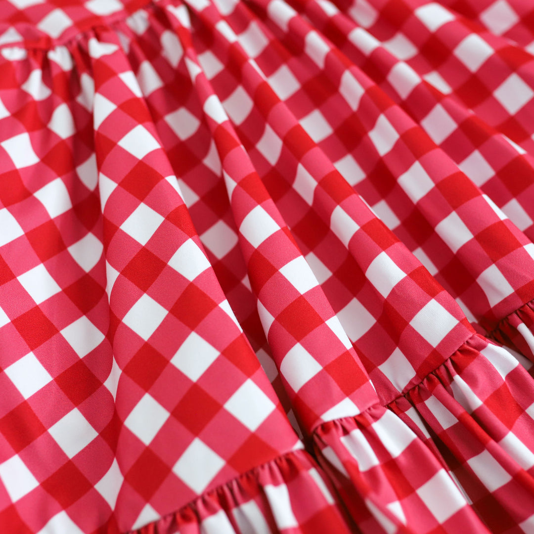 girls' red and white gingham dress detail