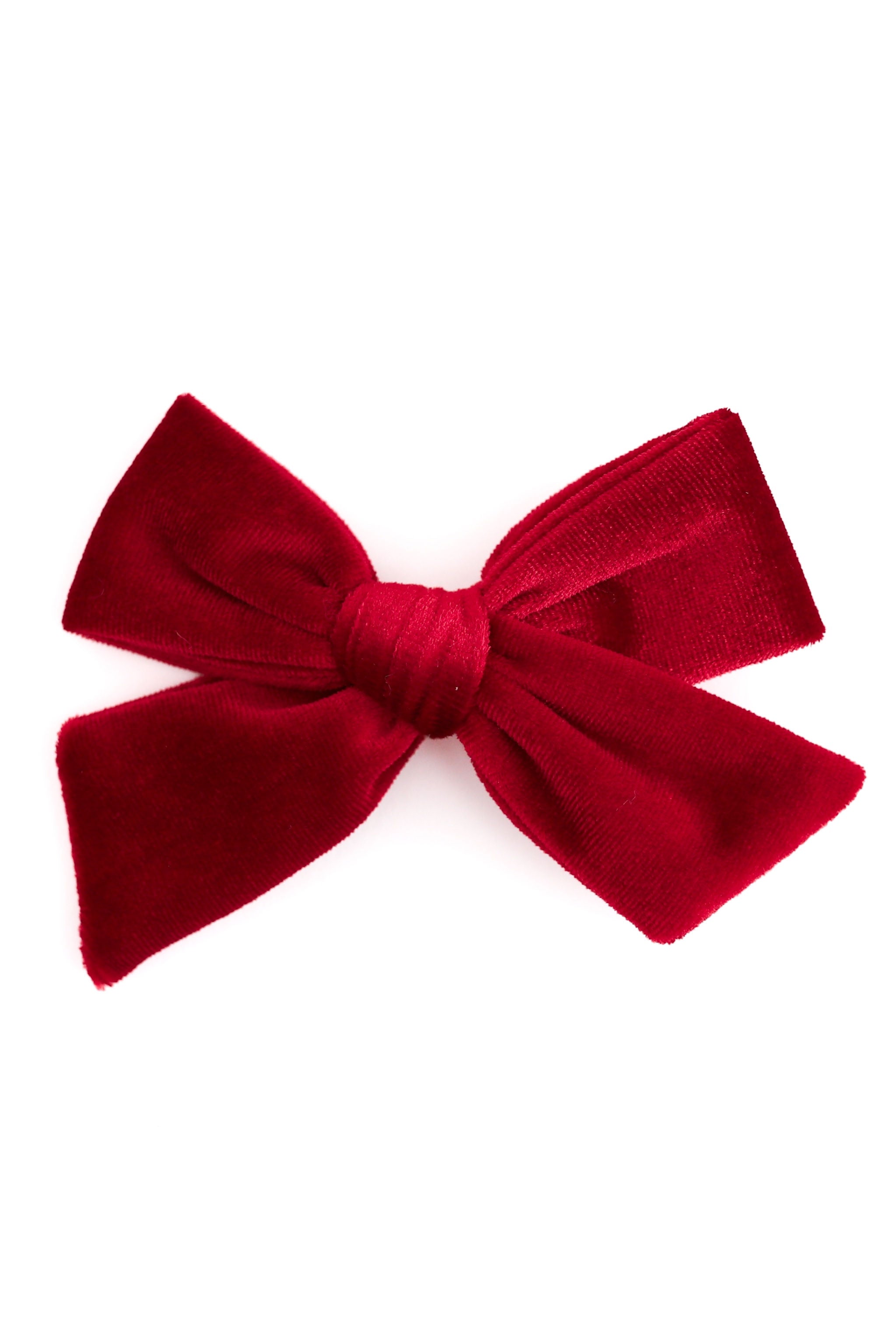 red velvet hair bow clip shown on solid white background