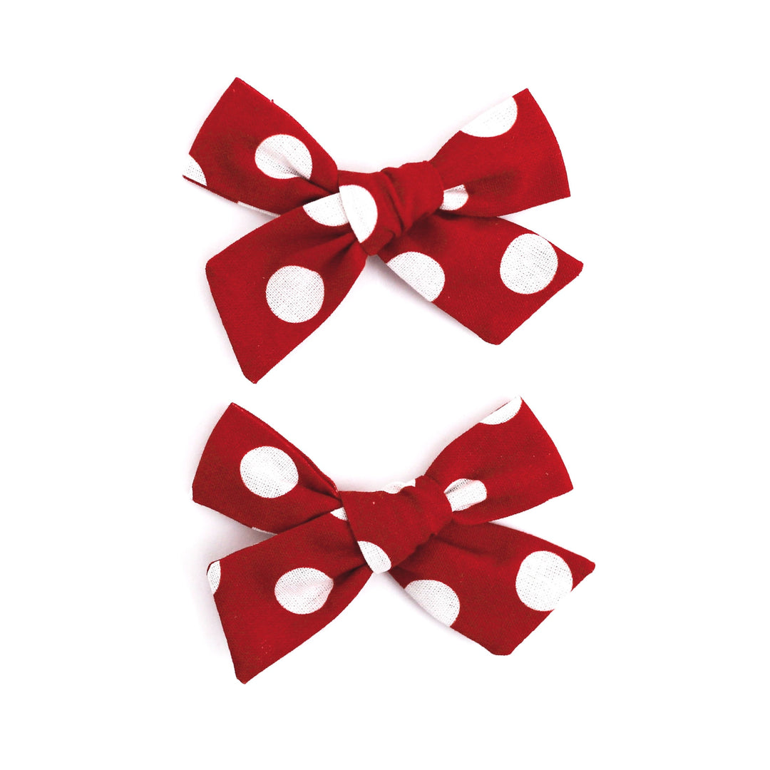 red with white polka dot pigtail bows