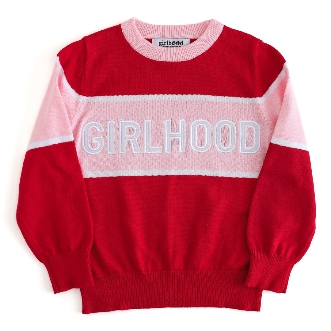 girl and adult cotton pullover sweater in red with pink accent stripe featuring embroidered "girlhood" patches 