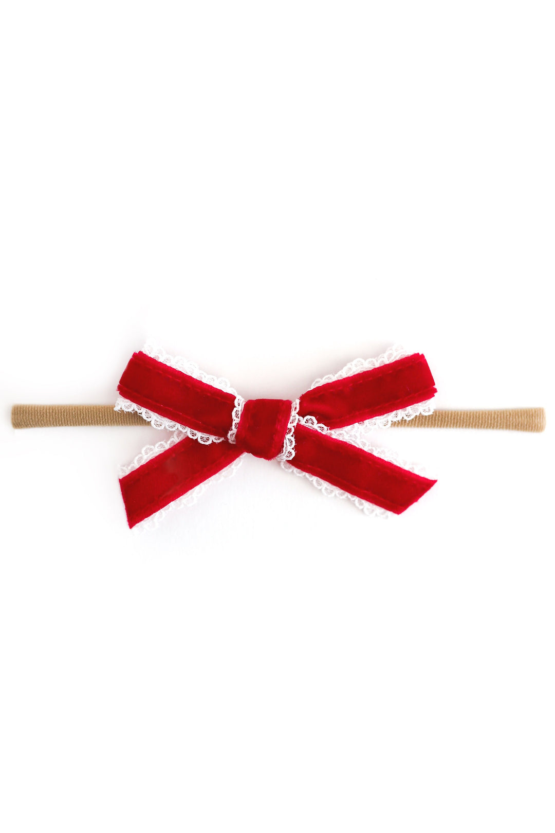christmas baby hair bow, red velvet with white lace trim on a nylon band