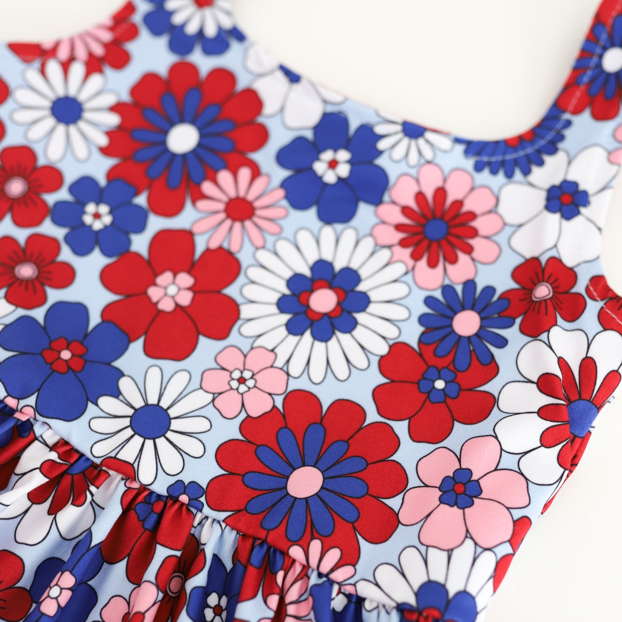 closeup of red, white and blue floral tank dress for fourth of july